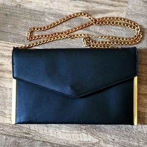 Black purse with some water spots still in good condition